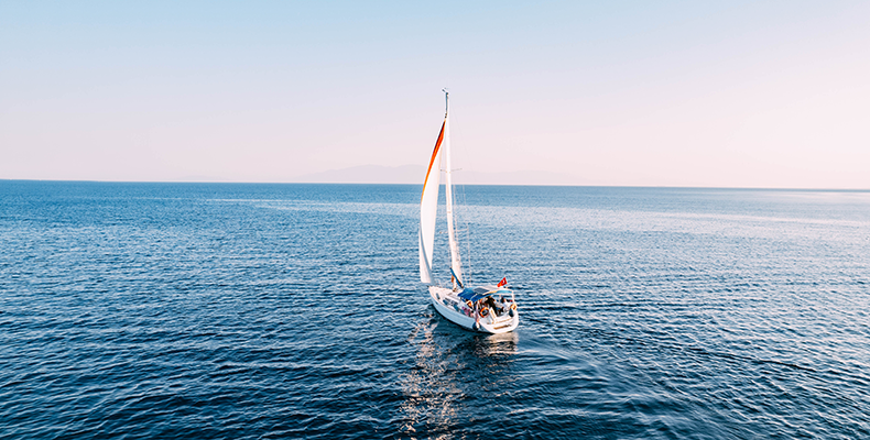 mast and keel on sailboat on placid water