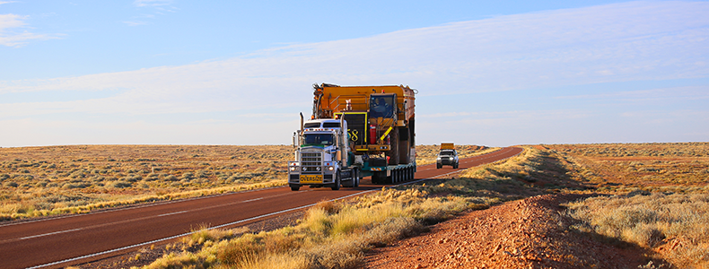flatbed shipping truck on the road