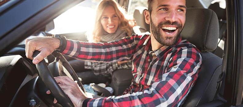 happy man and woman who shipped their vehicle with uShip