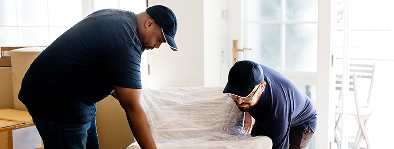 example of two movers lifting a couch
