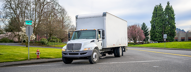 moving truck in driveway